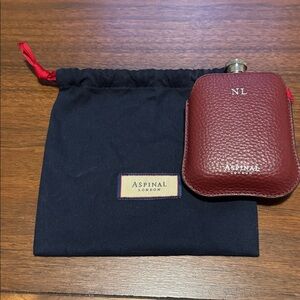Aspinal of London Burgundy Pebble Leather Hip Flask “NL” 5oz